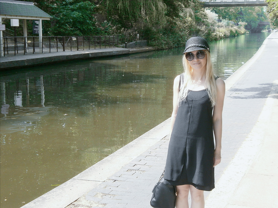 all black outfit for summer swing dress t-bar sandals raffia hat oversized shades