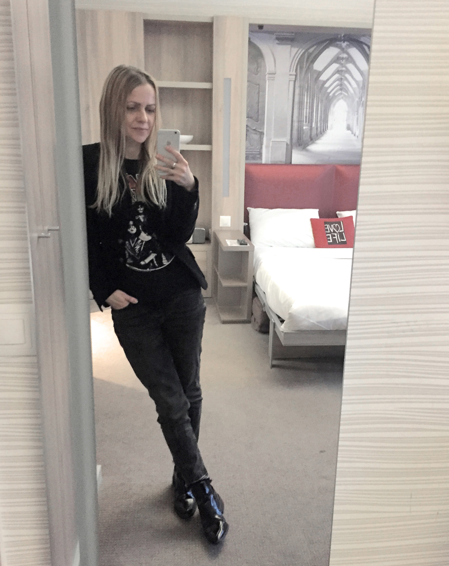 basel adagio apartment hotel gabriella epic street style ootd velvet blazer kiss band t-shirt ripped jeans ankle boots