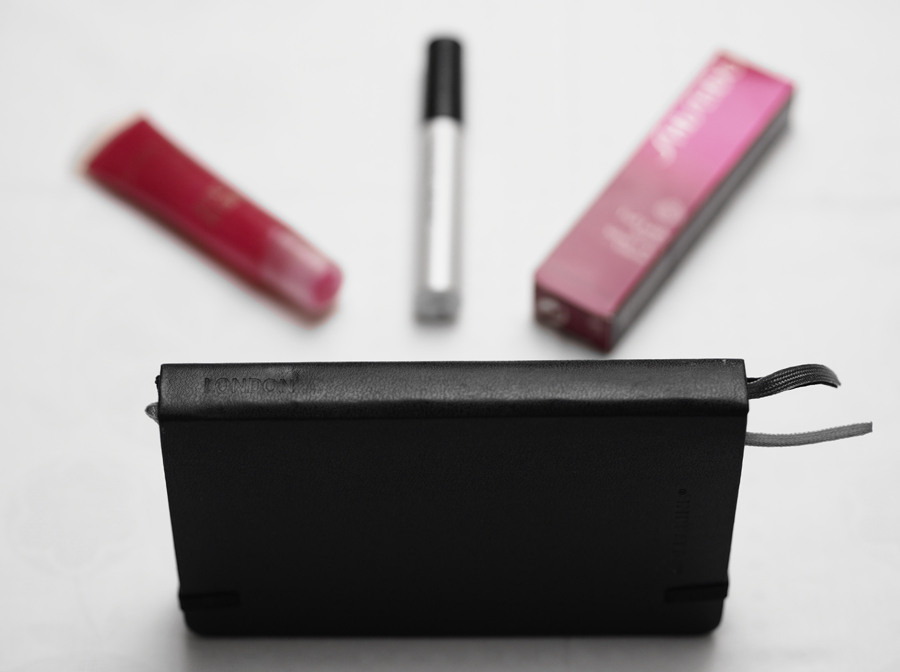 beauty and London essentials Moleskine London notebook Lancome Juicy Tubes Shiseido Full Lash Serum