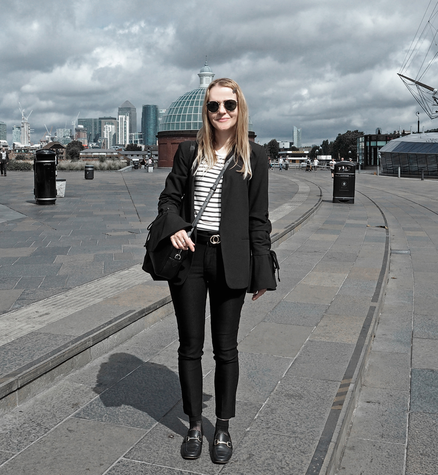 black suit striped tee lace-up bell sleeve blazer cropped trousers loafers mesh socks minimal luxe bag ray-ban