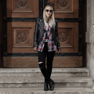 nineties grunge layered look leather biker check shirt round shades ripped jeans